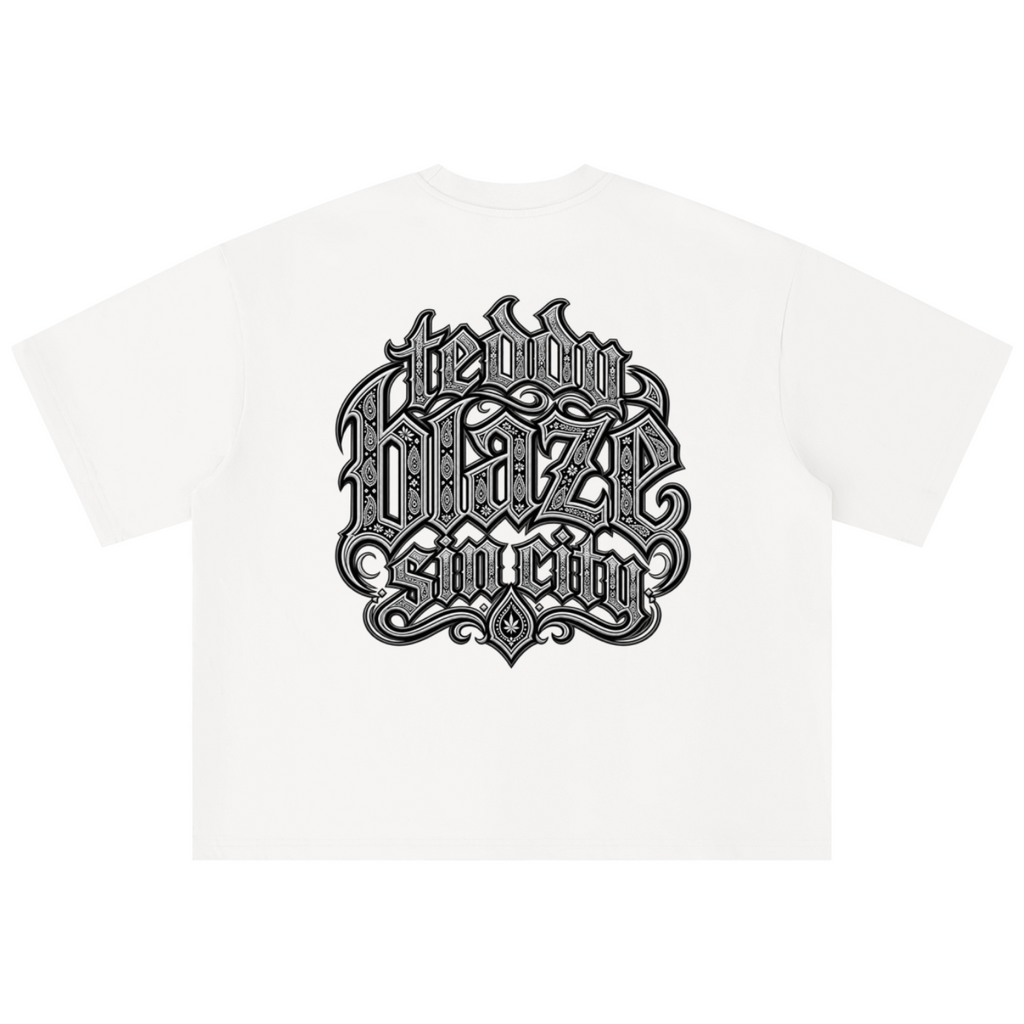 Elevate your streetwear with the Teddy Blaze Sin City Sacred Box Cut T-Shirt. Black stretch-cotton, tattoo praying hands print, and boxy cut. Shop NYC to Vegas style.
