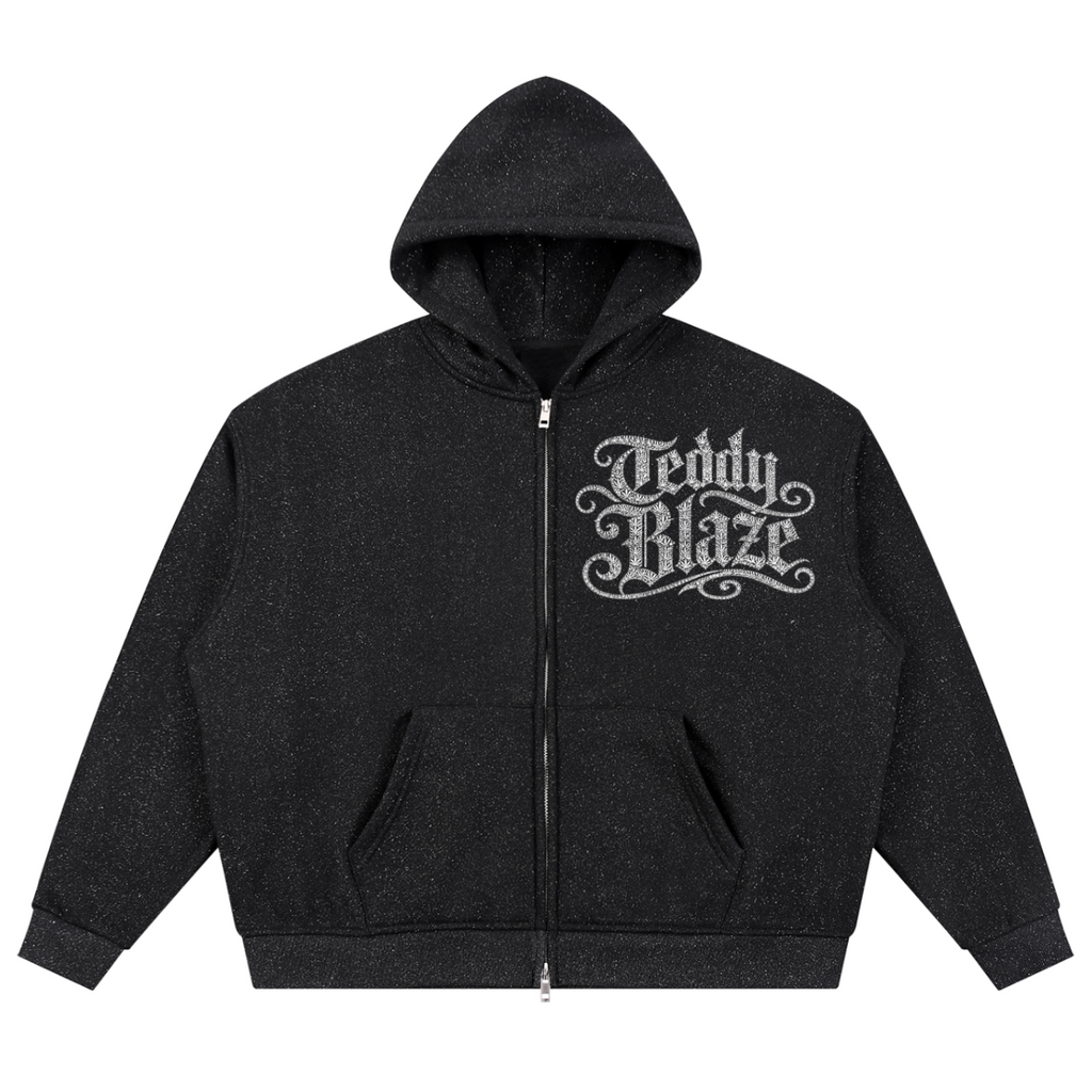 Black hoodie with a small graphic on the chest against a white background