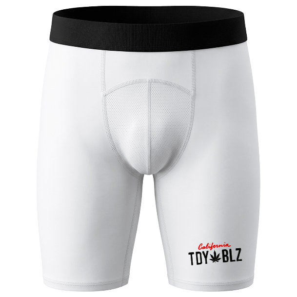 White protective cycling shorts with a black waistband and a black and red 'California TOY BLZ' logo on the left leg, shown against a plain white background.