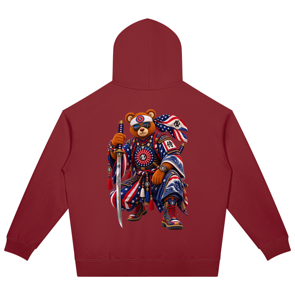Shop the Teddy Blaze Rising oversized heavyweight hoodie featuring Gye Nyame and Teddy Blaze Samurai artwork in a bold Afrodemia Americana cultural fusion.