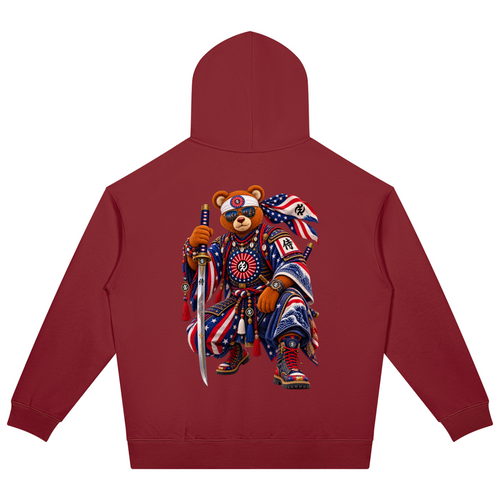 Shop the Teddy Blaze Rising oversized heavyweight hoodie featuring Gye Nyame and Teddy Blaze Samurai artwork in a bold Afrodemia Americana cultural fusion.