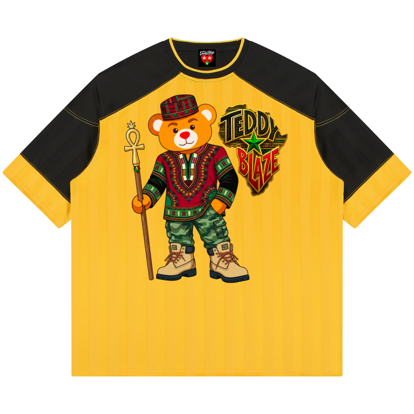 A yellow and black raglan t-shirt featuring a cartoon bear character in traditional African attire holding an ankh, alongside a 'TEDDY BLAZE' graphic on the front.