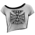 A light gray short-sleeve crop top with black trim and a large black graphic on the front reading 'EST TEDDY BLAZE 2020'.