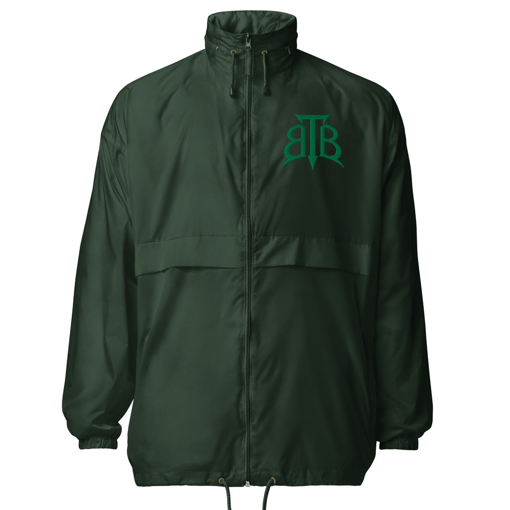 Shop the Embroidered BlazeCrest Fairway + Greens Windbreaker by Teddy Blaze. 202 GSM forest green technical jacket reflecting stealth wealth and quiet luxury from The Mature Mocha Collection.