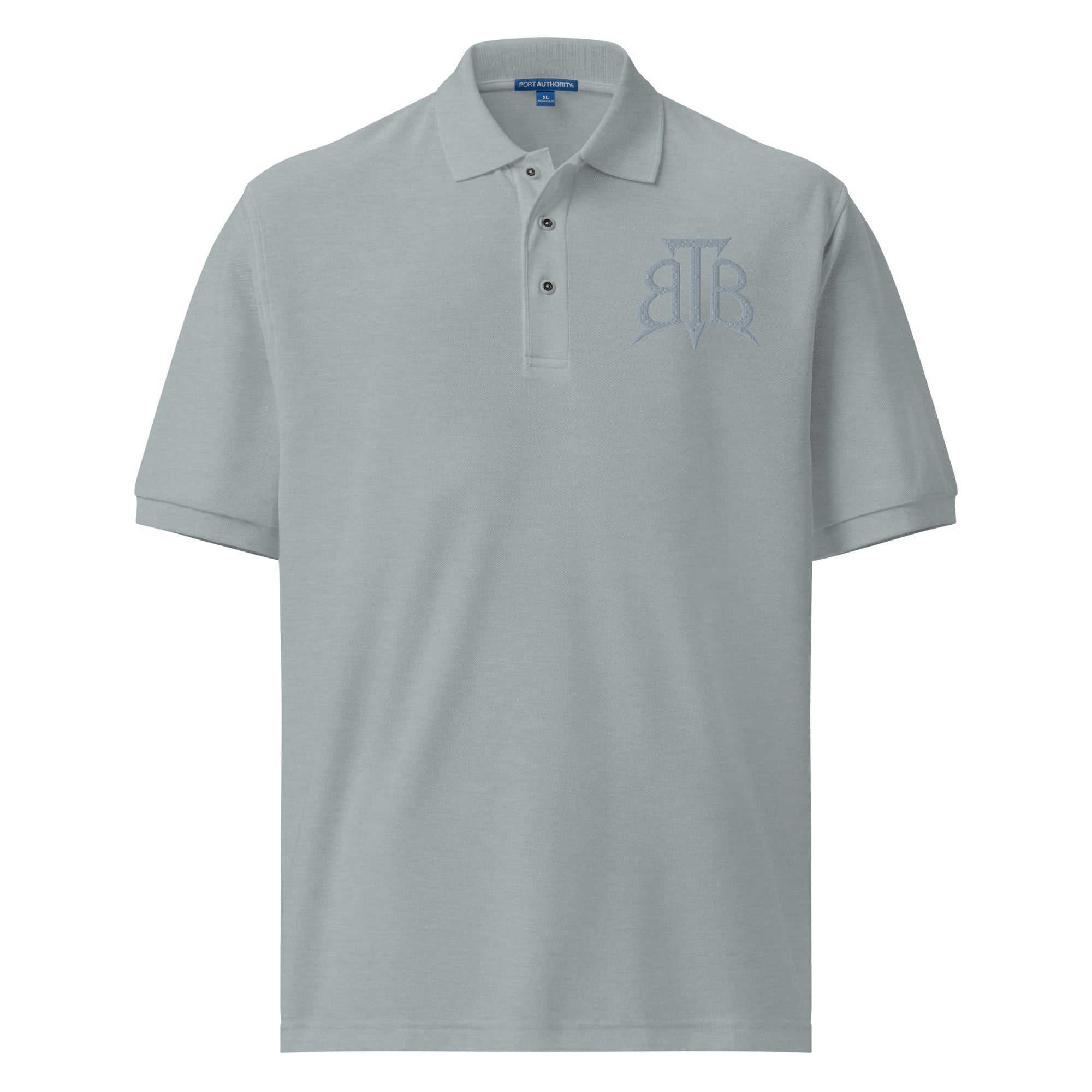 Shop the Embroidered BlazeCrest Polo by Teddy Blaze. 169.5 GSM ice blue pique polo embodying quiet luxury and stealth wealth from The Mature Mocha Collection.