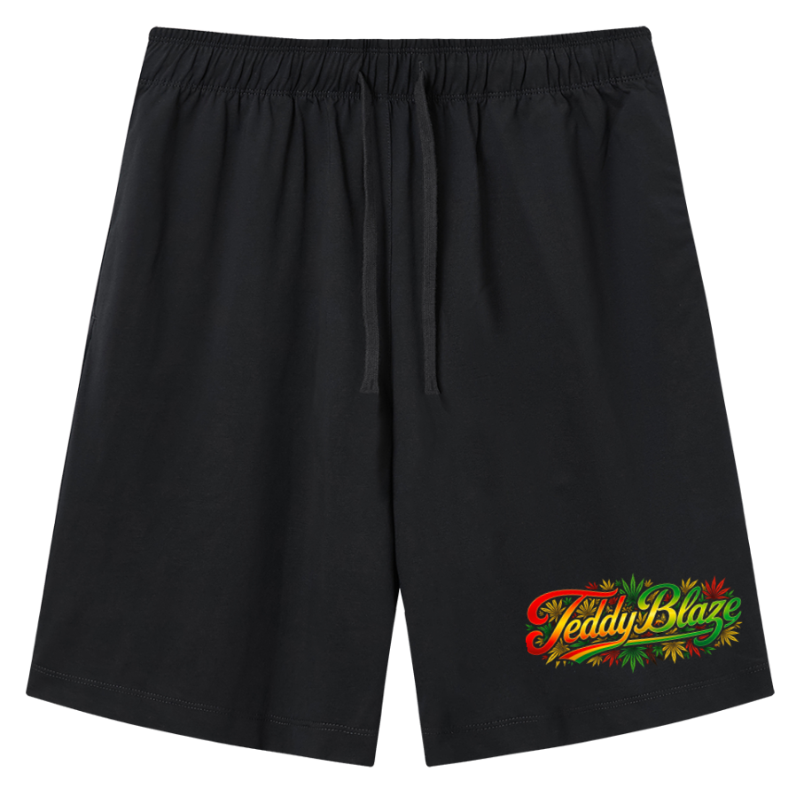 Black athletic shorts with an elastic waistband and drawstring, featuring a small red, yellow, and green graphic on the lower left leg that reads 'Fetty's Blaze'.