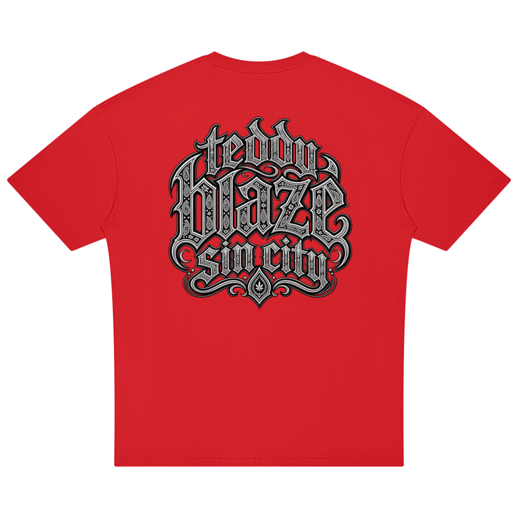 Elevate your streetwear with the Teddy Blaze Sin City Sacred Cotton Drop Shoulder Tee. Red cotton, tattoo praying hands print, and ornate back graphic. Shop NYC to Vegas style.