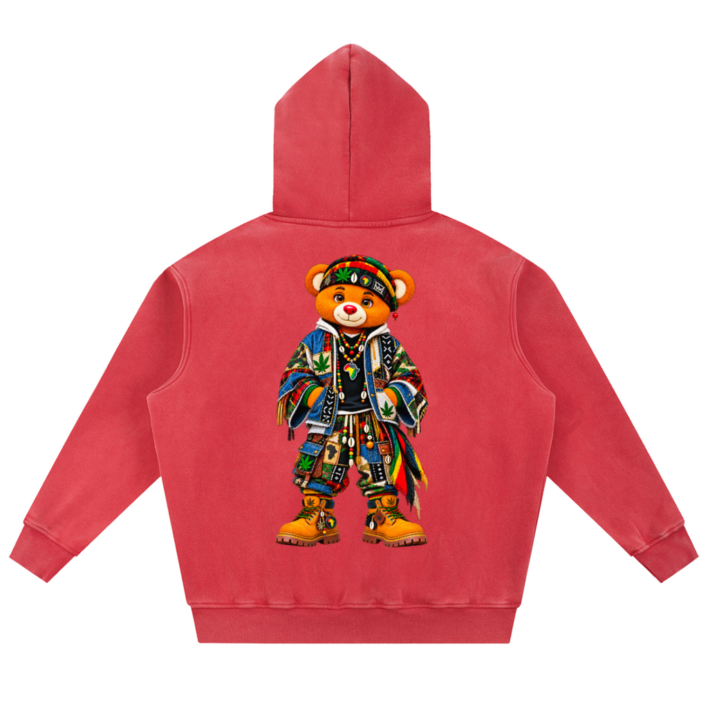A red hooded sweatshirt shown from the back, featuring a large graphic of a teddy bear wearing a colorful patterned outfit and hat on the center back.
