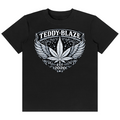 Shop the Flying High Classic Tee by Teddy Blaze. 180 GSM cotton-spandex stretch tee featuring an ornate winged crest graphic from the TOPS line of The Mature Mocha Collection.