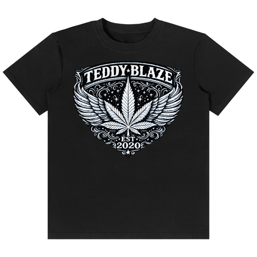 Shop the Flying High Classic Tee by Teddy Blaze. 180 GSM cotton-spandex stretch tee featuring an ornate winged crest graphic from the TOPS line of The Mature Mocha Collection.
