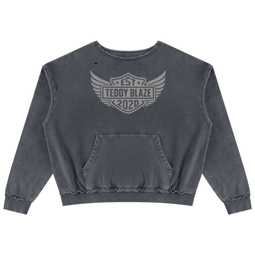 Shop the Freedom Crest Cotton Trucker Jumper by Teddy Blaze. Heavyweight 400 gsm snow-wash cotton crewneck sweater featuring a distressed hem, front pouch pocket, and DaCruz back print.