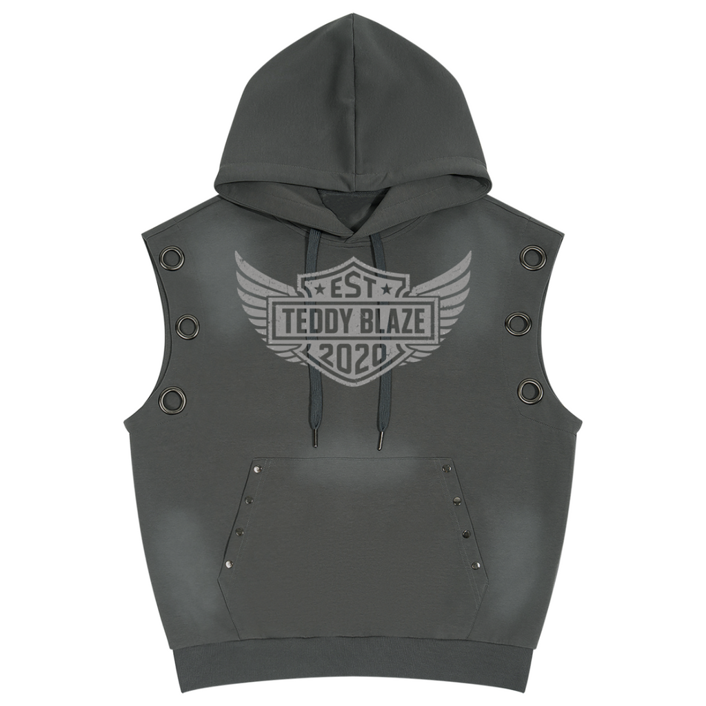 Shop the Freedom Crest Hooded Biker Vest by Teddy Blaze. 370 gsm mineral-grey sleeveless hoodie featuring grommet shoulder hardware, studded kangaroo pocket, and back DaCruz print.