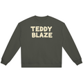 Shop the Freezer Tape Heavyweight Jumper by Teddy Blaze. 420 GSM olive cotton-fleece crewneck reflecting stealth wealth and quiet luxury from the TOPS line of The Mature Mocha Collection.