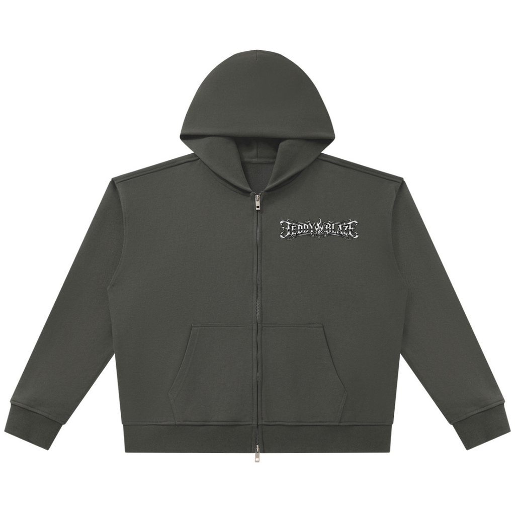 Shop the Fuego Cruz Heavy Cotton Zip Hoodie by Teddy Blaze. Heavyweight 420 gsm cotton full-zip hoodie with gothic chest script and DaCruz back crest.