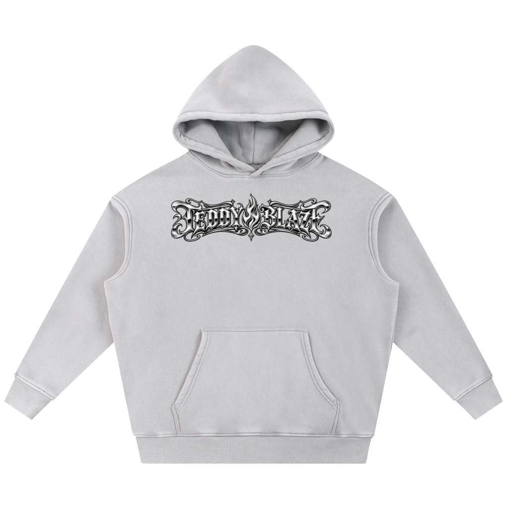 Shop the Fuego Cruz Snow Washed Fleece Pullover Hoodie by Teddy Blaze. Heavyweight 355 gsm snow-wash fleece hoodie with gothic chest logo and DaCruz back crest.