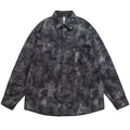 Shop the Iron + Ivy Mineral Wash Button-Down Overshirt by Teddy Blaze. Loose fit dark grey cotton-blend button-up featuring a distressed brushstroke wash and dual chest pockets.
