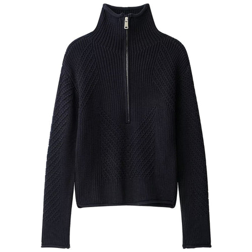 Shop the Iron + Ivy Quarter-Zip Ribbed Knit Sweater by Teddy Blaze. Heavyweight knitted cotton pullover featuring a high stand collar, chevron ribbing, and silver zip hardware.