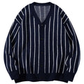 Shop the Iron + Ivy Vertical Pinstripe V-Neck Cardigan by Teddy Blaze. Oversized dark blue jacquard knit button-down cardigan sweater featuring crisp white pinstripes.