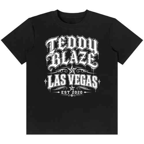 Shop the Las Vegas Tattoo Tee by Teddy Blaze. 180 GSM cotton-spandex stretch tee featuring Chicano tattoo script typography from the TOPS line of The Mature Mocha Collection.