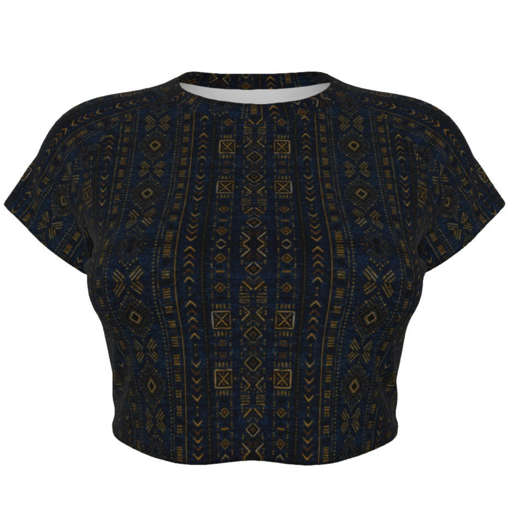 Shop the Teddy Blaze Mud of Indigo™ Cropped Tee, a stretch microfiber crop top with raglan sleeves and rich indigo African-inspired geometric patternwork.