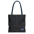 Carry more in the Teddy Blaze Mud of Indigo Grab + Go Bag, an 18" oversized tote featuring indigo mudcloth-inspired artwork, boxed corners and reinforced handles.