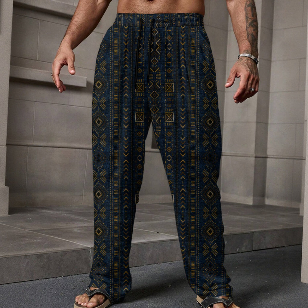 Shop Teddy Blaze Mud of Indigo™ Lounge Pants in lightweight Performance Linen, featuring an indigo and earthen-gold mudcloth-inspired pattern, relaxed fit and pockets.