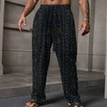 Shop Teddy Blaze Mud of Indigo™ Lounge Pants in lightweight Performance Linen, featuring an indigo and earthen-gold mudcloth-inspired pattern, relaxed fit and pockets.