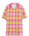 Shop the Iron + Ivy Passion Fruit Plaid Camp Shirt by Teddy Blaze. Lightweight short-sleeve resort button-down featuring a pink, yellow, and white plaid layout with a notch camp collar.