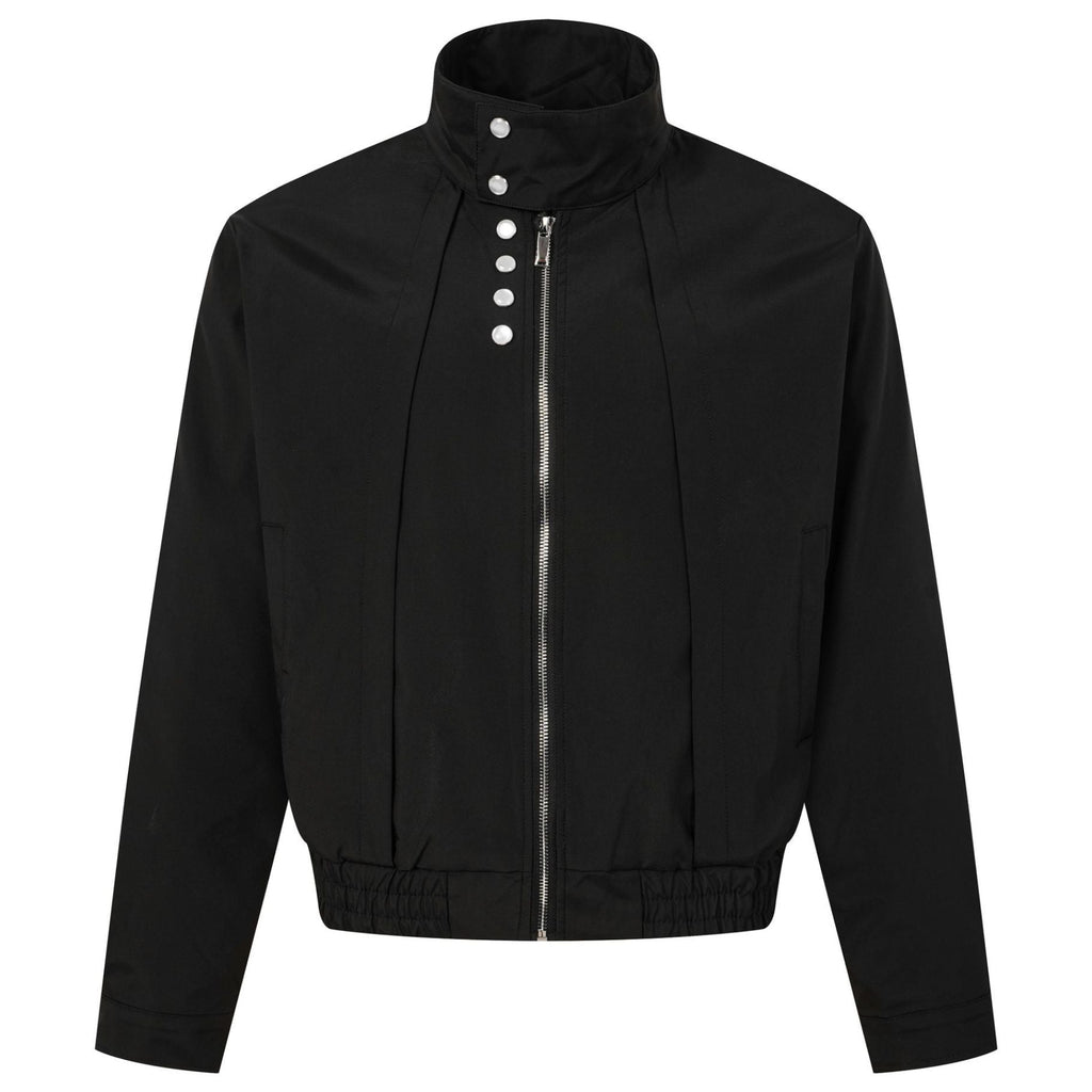 Shop the Iron + Ivy Pleated Asymmetric Snap Funnel Jacket by Teddy Blaze. Men’s urban woven jacket featuring front vertical pleats, asymmetrical pearl snaps, and a high stand collar.