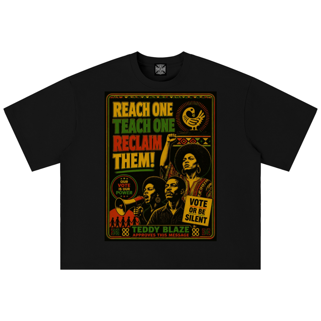 A black short-sleeve t-shirt with a large, colorful graphic print on the front. The graphic features the text 'REACH ONE TEACH ONE RECLAIM THEM!' in green, yellow, and red, alongside portraits of civil rights figures and the text 'VOTE OR BE SILENT' and 'TEDDY BLAZE'.