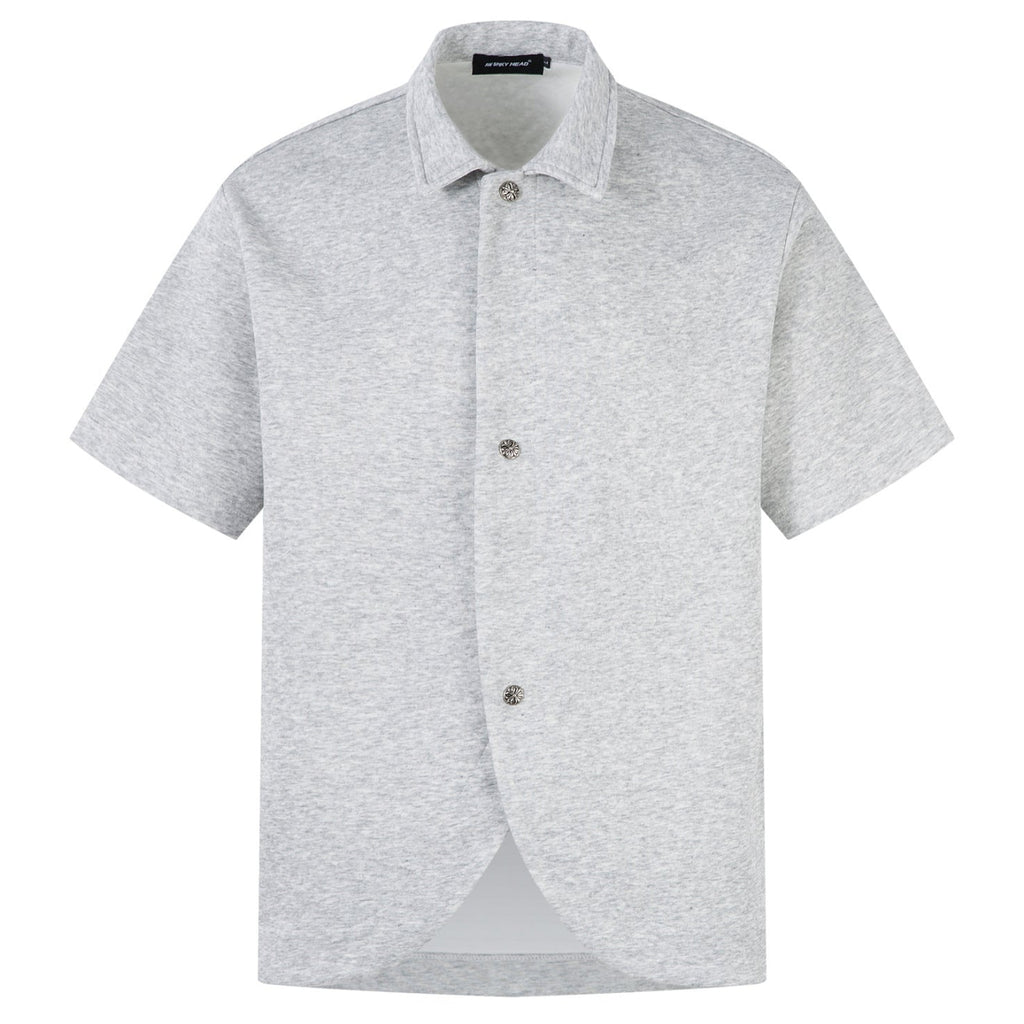 Shop the Retro Button Cutaway Polo Shirt by Teddy Blaze. Wrinkle-resistant technical interlock polo featuring retro silver buttons and a cutaway hem from THE IVY MAN.