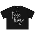 Shop the Teddy Blaze Signature Boxy Oversized Tee, a 210 GSM cotton-blend unisex tee with relaxed proportions and a bold monochrome Signature graphic.