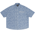 Shop the Signature Boxy Vintage Wash Denim Camp Shirt by Teddy Blaze. Lightweight 230 GSM blue striated denim short sleeve button-up from THE BLAZE MAN.