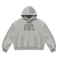 Shop the Signature Cachet Vintage Wash Boxy Fleece Hooded Jumper by Teddy Blaze. 390 GSM heavy slate gray hoodie featuring the Cachet emblem from The Mature Mocha Collection.