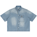 Shop the Signature Cachet Vintage Wash Boxy Short Denim Camp Shirt by Teddy Blaze. 320 GSM light wash denim short sleeve shirt featuring western yoke and Cachet emblem from The Mature Mocha Collection.