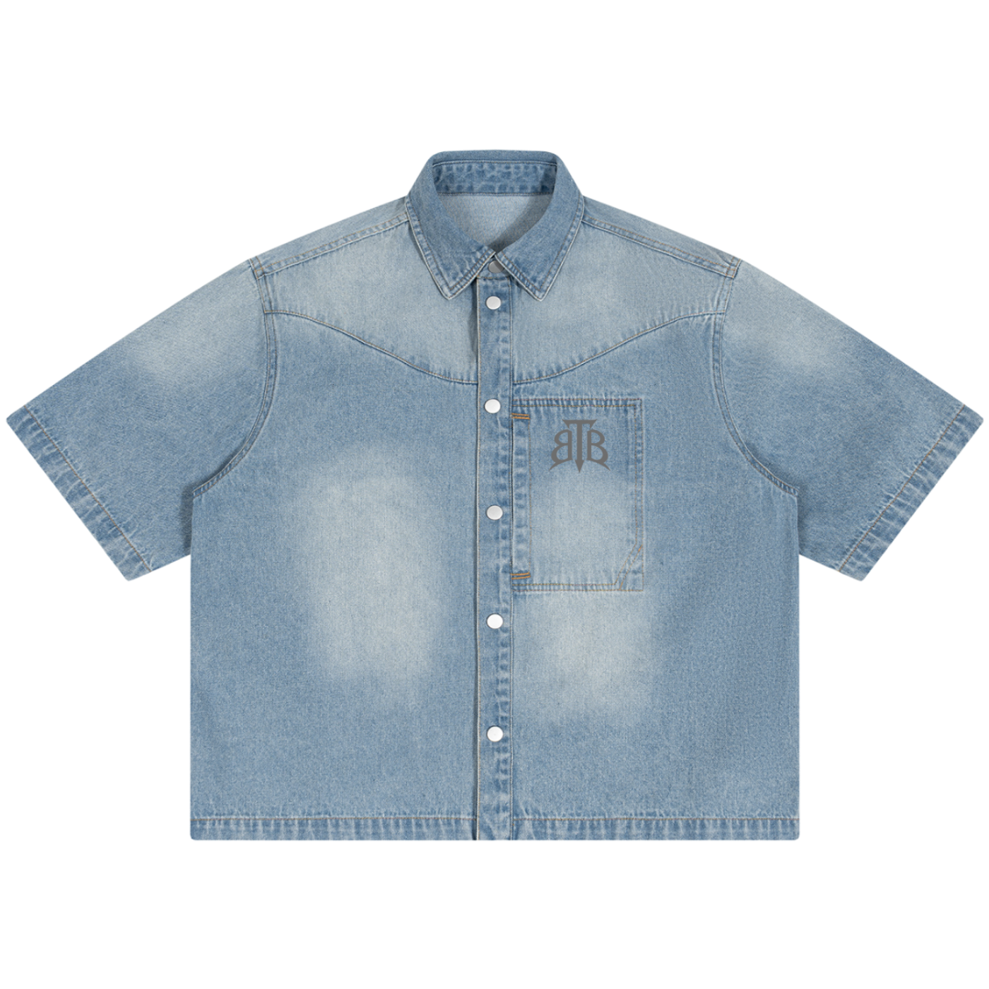Shop the Signature Cachet Vintage Wash Boxy Short Denim Camp Shirt by Teddy Blaze. 320 GSM light wash denim short sleeve shirt featuring western yoke and Cachet emblem from The Mature Mocha Collection.