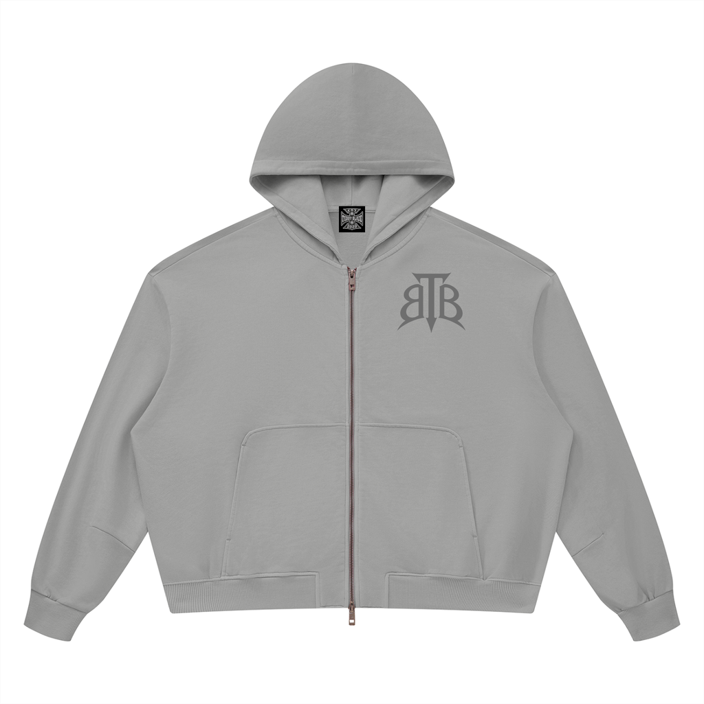 Shop the Signature Cachet Vintage Wash Boxy Zip Up Hoodie by Teddy Blaze. 360 GSM slate gray cotton zip hoodie featuring the Cachet emblem from The Mature Mocha Collection.