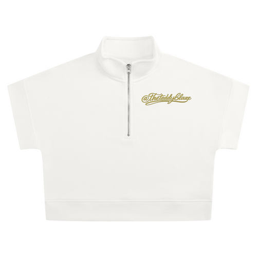 Shop the Signature Cropped Quarter-Zip by Teddy Blaze. Heavyweight white fleece short-sleeve crop top featuring gold script branding from THE BLAZE WOMAN.