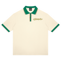 Shop the Signature On the Greens Slim Fit Golf Shirt by Teddy Blaze. 240 GSM cream piqué golf polo with forest green and gold trim from THE BLAZE MAN.