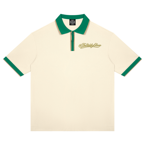 Shop the Signature On the Greens Slim Fit Golf Shirt by Teddy Blaze. 240 GSM cream piqué golf polo with forest green and gold trim from THE BLAZE MAN.