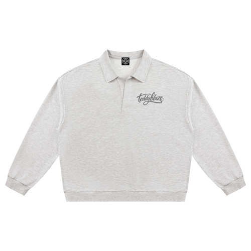 Shop the Signature Oversized Fleece Rugby Shirt by Teddy Blaze. 310 GSM ash heather fleece rugby polo reflecting stealth wealth and quiet luxury from the TOPS category of The Mature Mocha Collection.