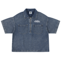 A short-sleeve denim work shirt with a half-zip collar, two front chest pockets, and a white embroidered logo on the left chest, shown flat against a white background.