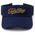 Shop the Teddy Blaze Signature Sun Visor, a navy open-top visor finished with gold Teddy Blaze script embroidery for elevated everyday and resort styling.