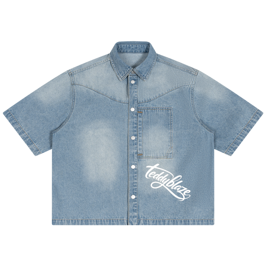 Shop the Signature Vintage Wash Boxy Short Denim Shirt by Teddy Blaze. 320 GSM light-wash short-sleeve denim shirt reflecting stealth wealth and quiet luxury from the TOPS category of The Mature Mocha Collection.