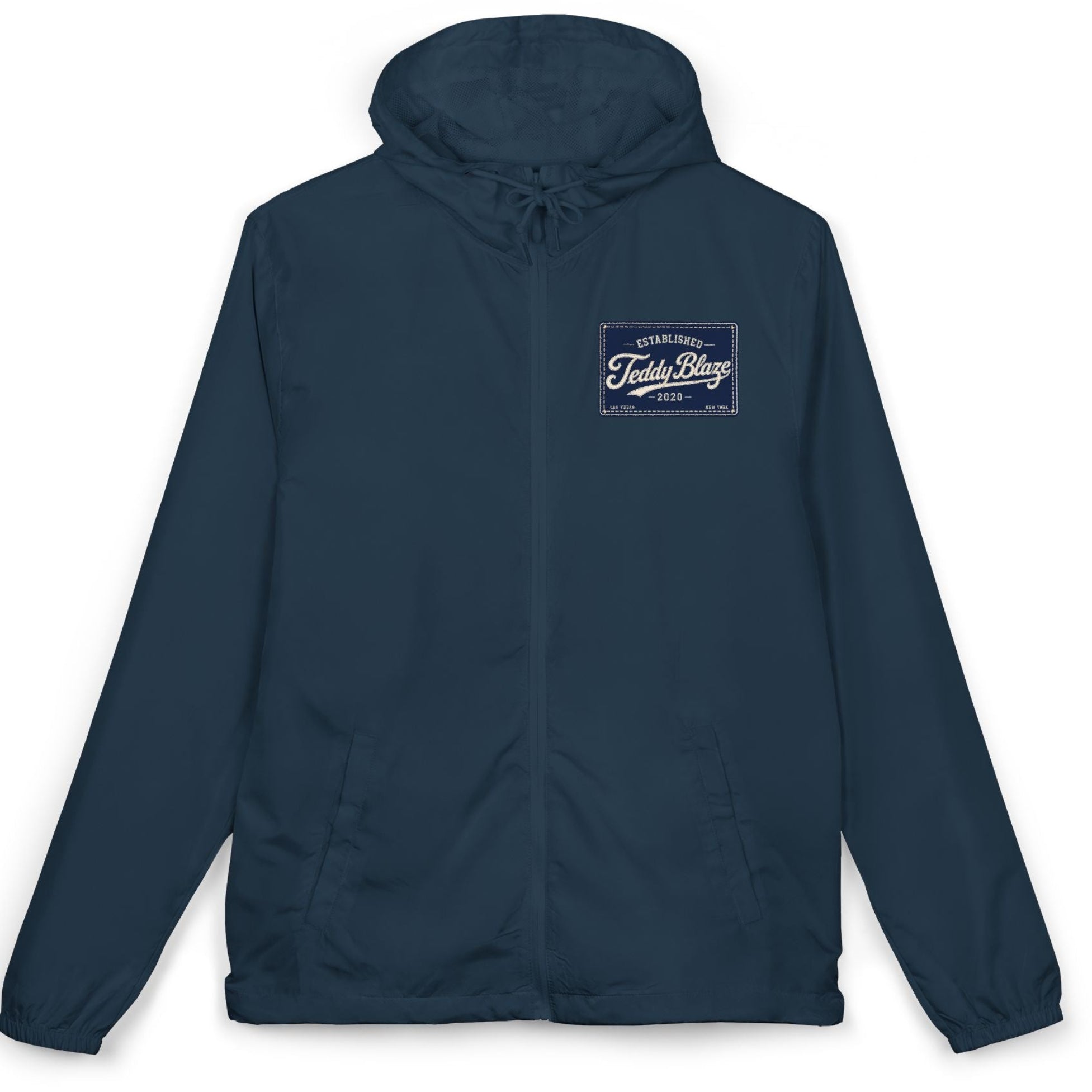 Shop the Teddy Blaze Signature Windbreaker, a lightweight navy water-resistant jacket with signature graphics, mesh hood and adjustable fit.