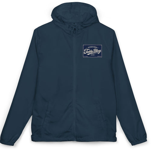 Shop the Teddy Blaze Signature Windbreaker, a lightweight navy water-resistant jacket with signature graphics, mesh hood and adjustable fit.