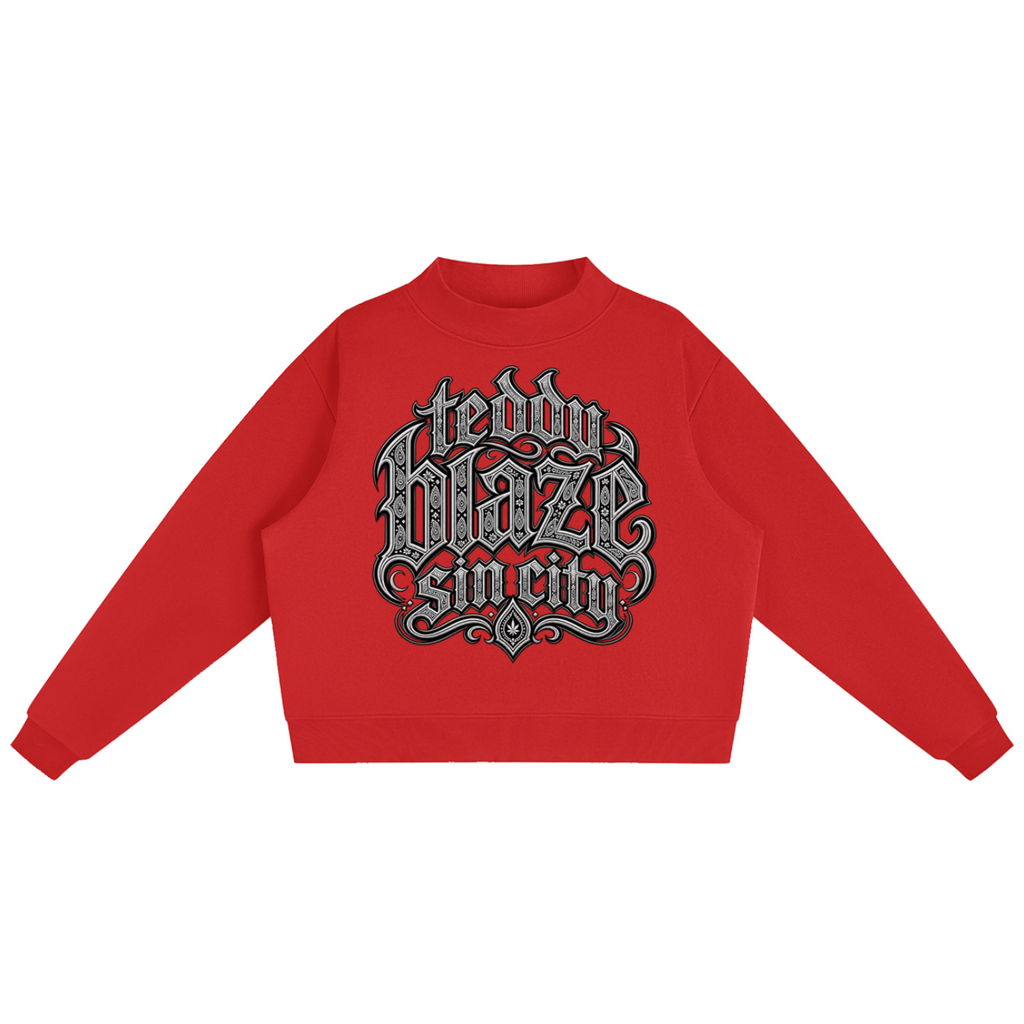 Elevate your cold-weather layers with the Teddy Blaze Sin City Fleece Mock-Neck Jumper. Red heavy fleece, ribbed mock neck, and ornate Sin City logo chest print. Shop NYC to Vegas style.