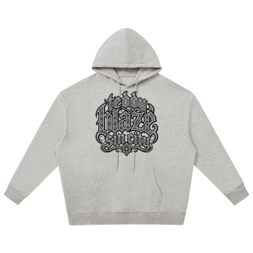 Elevate your cool-weather layers with the Teddy Blaze Sin City Relaxed Pullover Hoodie. Heather gray fleece hoodie with Sin City front print and tattoo praying hands back graphic. Shop NYC to Vegas style.