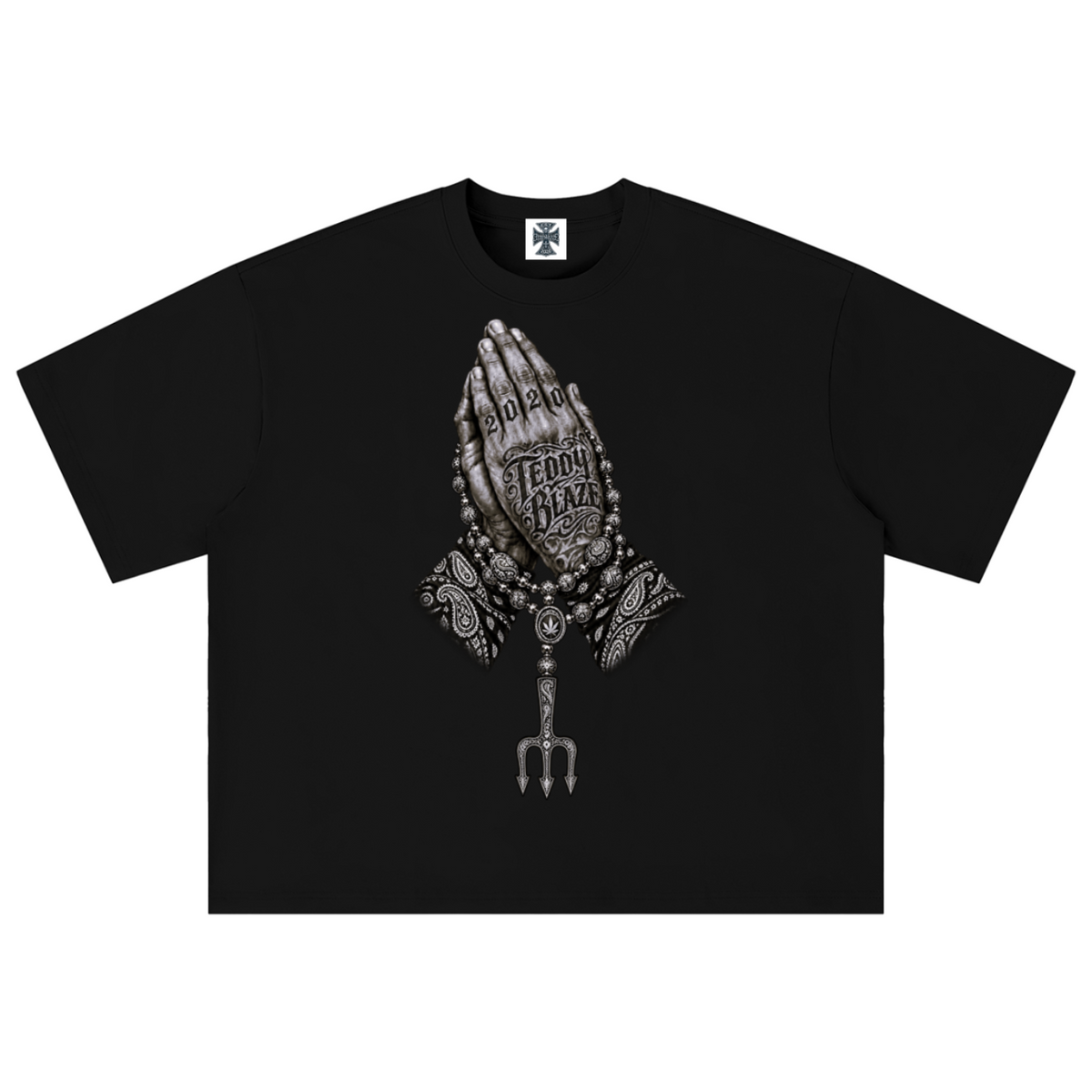 Elevate your streetwear with the Teddy Blaze Sin City Sacred Box Cut T-Shirt. Black stretch-cotton, tattoo praying hands print, and boxy cut. Shop NYC to Vegas style.