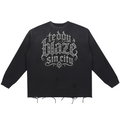 Elevate your distressed layers with the Teddy Blaze Sin City Snow Wash Raw Edge Cotton Jumper. Charcoal snow-washed cotton, raw frayed hem, and tattoo praying hands back print. Shop NYC to Vegas style.